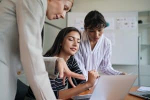 business people have a meeting about company statistics